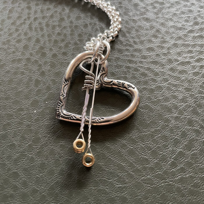 ”Love letter” heart pendant with  TWO played strings